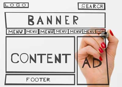 A hand with red nail polish draws a website layout on a transparent screen for a Surrey SEO Agency, showing labeled sections: logo, search, banner, multiple menus, content, ad, and footer.